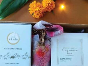 Box 1 – One 80ml candle, a box of incense cones, and a handmade toran